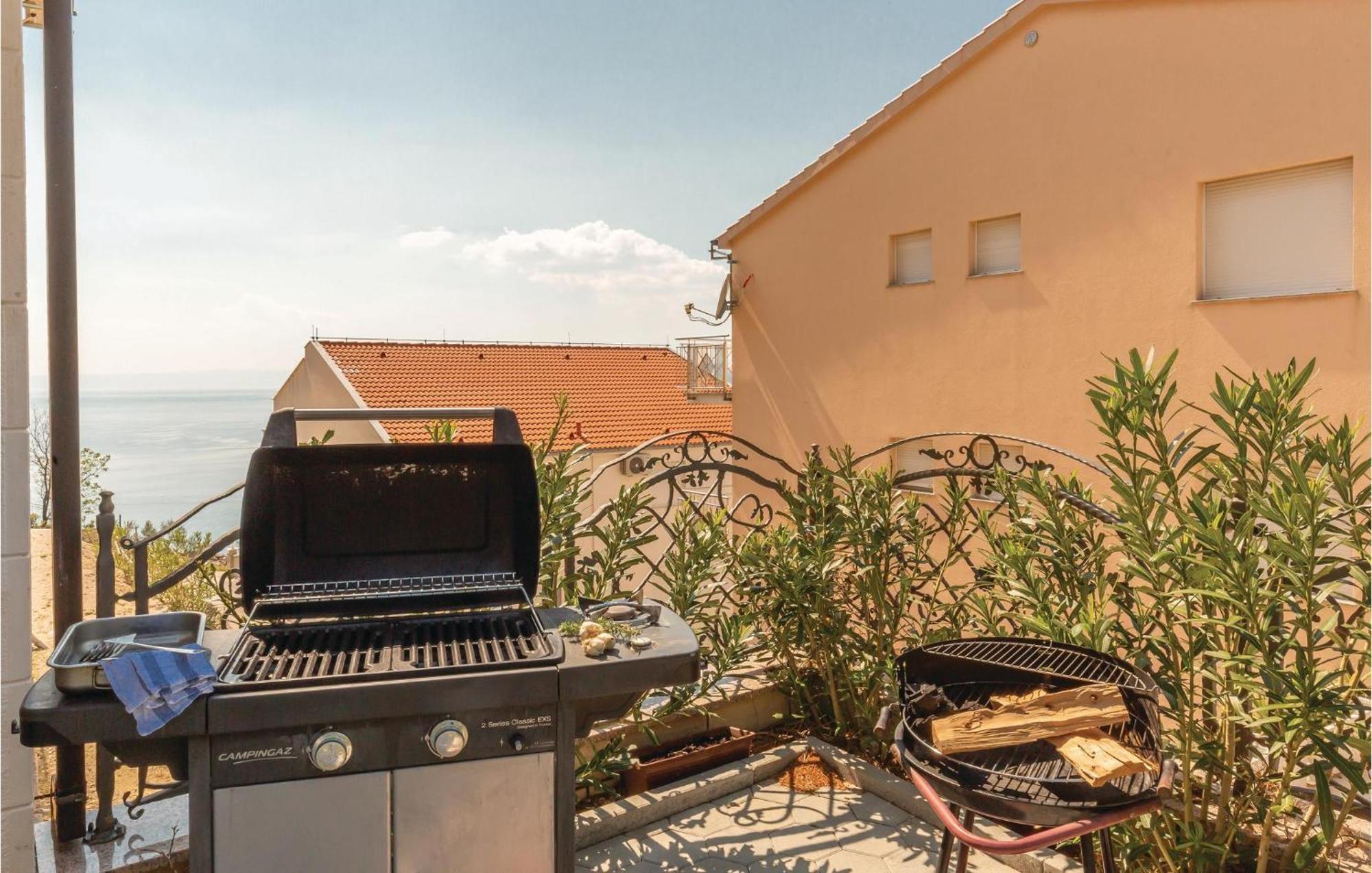 Nice Apartment In Krvavica With House Sea View Zewnętrze zdjęcie